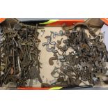 * A box containing a collection of gunsmithing parts, to include hammers, trigger guards,