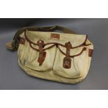 Hardy, a canvas and leather trimmed fishing bag.