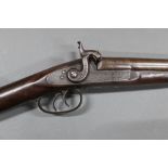 * A percussion muzzle loading double barrelled shotgun, with 27 1/2" Damascus barrels,