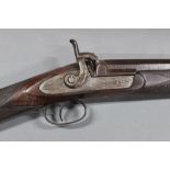 * A percussion muzzle loading single barrel shotgun,