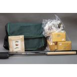 A Grand Slam 14' salmon fly rod, one Lure Flash Planer tackle bag, 100 salmon flies,