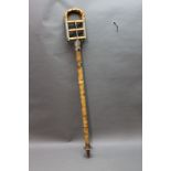 * A bamboo shooting stick, height when closed 89 cm.