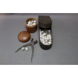 * A Treen pot and a tin containing various types of musket balls and a bullet mould.