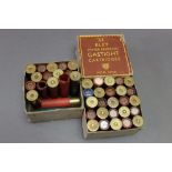 * A collection of 10 bore shotgun cartridges, paper and plastic cases, various makers.