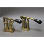 * Two pieces of reloading equipment, capper decappers, to include a four pillar version stamped 12.