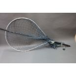 A Whitlock extending landing net, the head width 52 cm.