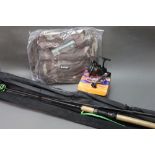 A Masterline Power Spin 11' 6" rod, together with three others,