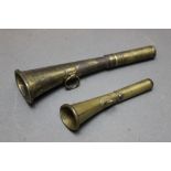 * Two brass horns, the larger 16 cm marked Caldbeck 1932 and the smaller 10.5 cm.