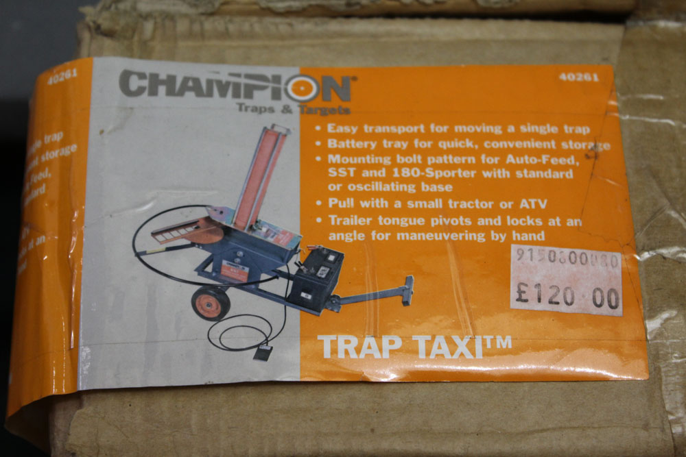 A Champion trap taxi, new in sealed box.