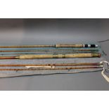 Two split cane rods, a trout fly rod in three sections, 9' and a Hexicane salmon spinning rod,