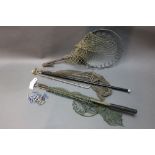 Three vintage landing nets, together with twenty four cast golden sprat Devon minnows.