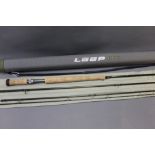 Loop Opti fly rod in four sections, 12' 4", line 8-9, with hard rod tube.