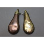 * A near pair of powder flasks, with border decoration, the one stamped Sykes Patent 19 cm,