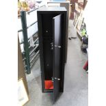 A six gun cabinet, suitable for rifles with scopes. Height 131 cm, width 35 cm, depth 30 cm.