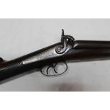 * A muzzle loading percussion shotgun, with 29 1/2" Damascus barrels,