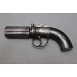 * A six shot pepperbox pistol, with 3" barrels. Overall length 21 cm.