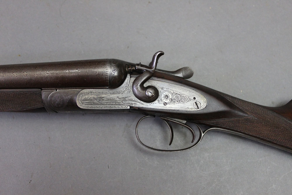 * Midland Gun Company a 12 bore side by side shotgun, with 30" Damascus barrels, 2 1/2" chambers,