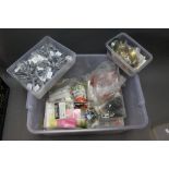 A plastic box containing flying C making equipment, hooks, weights etc,