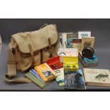 A vintage Brady fishing bag, together with pieces of tackle, various books,