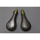 * Two steel bodied powder flasks, G & J.W.