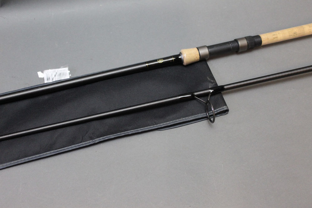A Wychwood Extremis rod, in two sections, 12', 3 lb curve.