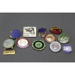 Eleven greyhound racing and hunting badges, to include Peterborough Stadium, Kenyon Coursing Club,