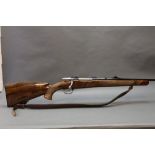 A Browning cal 308 bolt action rifle (possibly a Medallion Deluxe model) with engraving to the