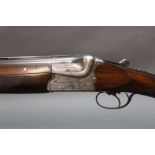 AYA coral deluxe 12 bore over/under shotgun, with 28" barrels, quarter and improved choke,