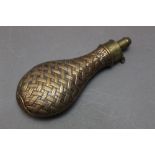 * G & J.W. Hawksley a copper bodied powder flask with basket weave design, length 20 cm.