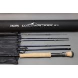 A Daiwa Wilderness travel fly rod, in six sections. 10', line 7.