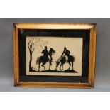 A pair of fox hunting silhouettes. 32 x 42 cm in birds eye maple frames.