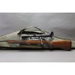 A Tikka M590 cal 223 Rem left handed bolt action rifle, screw cut with wooden stock,