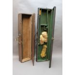 * A canvas shotgun motor case, opening to a green baize lined interior, with space for 28" barrels,