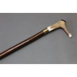 A hazel shafted walking stick with metal collar and stag antler handle with combined whistle.