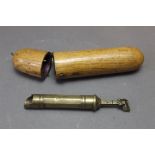 * An unusual brass 19th century powder measure,