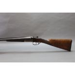 An AYA Yeoman 12 bore side by side shotgun, with 28" barrels, quarter and half choke,