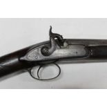 * A muzzle loading percussion shotgun, with a 33" barrel hexagonal at the breech end,