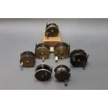Seven early 20th century reels, to include Prickman of Exeter, 2 1/4", various other brass reels,