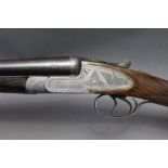 An Army & Navy 16 bore side by side shotgun, with 28" barrels, cylinder and cylinder choke,