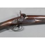 * A percussion muzzle loading double barrelled shotgun, with 29 1/2" Damascus barrels,