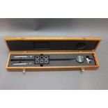 A Premier gun barrel bore gauge, with Mitutoya digital dial, measures 8, 10, 12, 16,