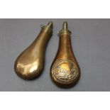 * Dixon & Son a copper bodied powder flask, embossed with pointers and handler, 21 cm,
