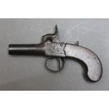 * A percussion pocket pistol, with a 1 1/2" screw off barrel. Overall length 15 cm.