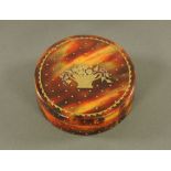 A tortoiseshell lidded circular box,