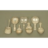 Seven George IV and William IV silver caddy spoons by Ledsam & Vale,