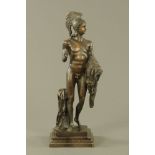 A bronze Romanesque figure of a warrior, reproduction, raised on a marble plinth. Height 63 cm.