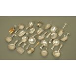 An important collection of twenty three George III silver caddy spoons by Cocks & Bettridge,