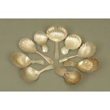 Four George III and later silver caddy spoons, with scalloped bowls by John Thropp or Joseph Taylor,