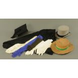 A straw boater, top hat, six pairs of evening gloves and a mortar board and robe.