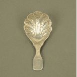 An early Victorian silver fiddle pattern caddy spoon by W E, possibly William Eaton,